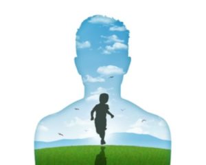 silhouette of a young man's portrait showing his inner child living in his mind